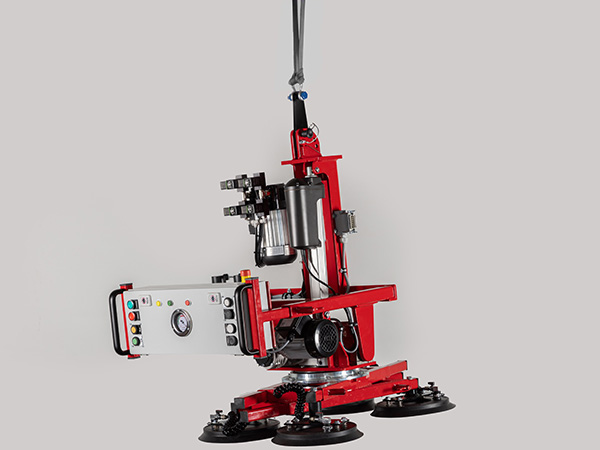 Vacuum lifter with electric rotation function and electric slew function