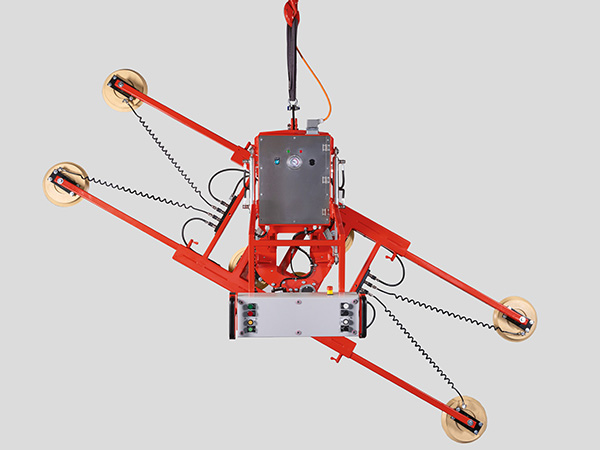 Vacuum lifter with electric rotation function and hydraulic slew function