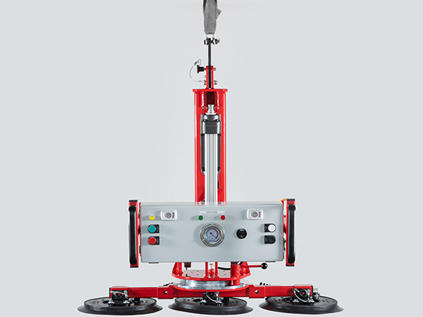 Vacuum lifter with manual rotation function and electric slew function